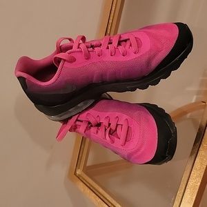 Extremely comfortable pink and black nike shoe